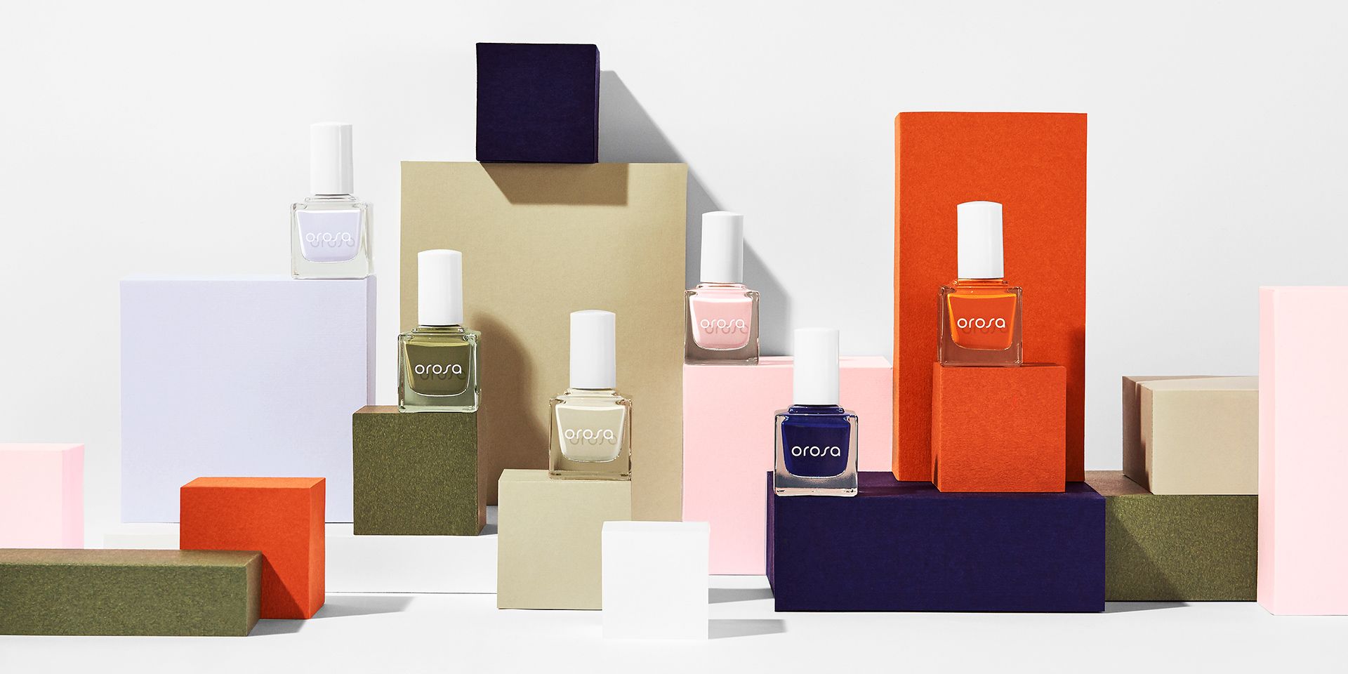 Orosa Fall collection product lineup showing complete range of nail care products with seasonal color palette
