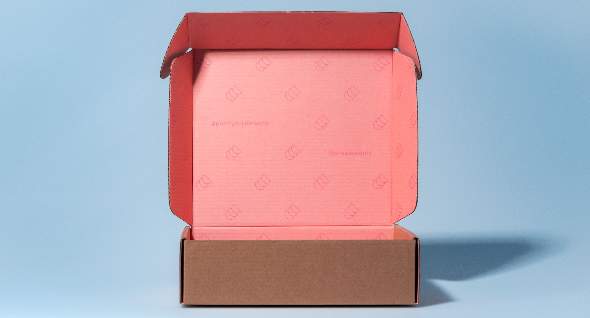 Orosa branded shipping box with playful visual elements and bold typography