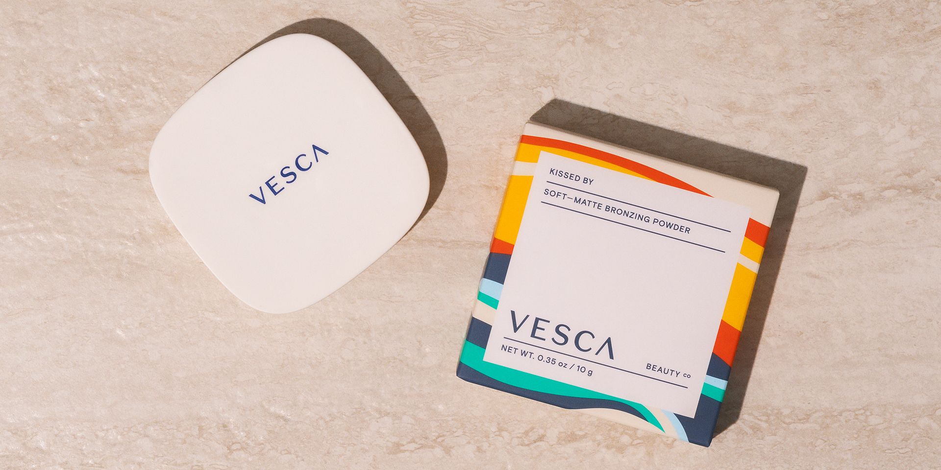 Vesca retail packaging showcasing bronzer products with sophisticated brand presentation