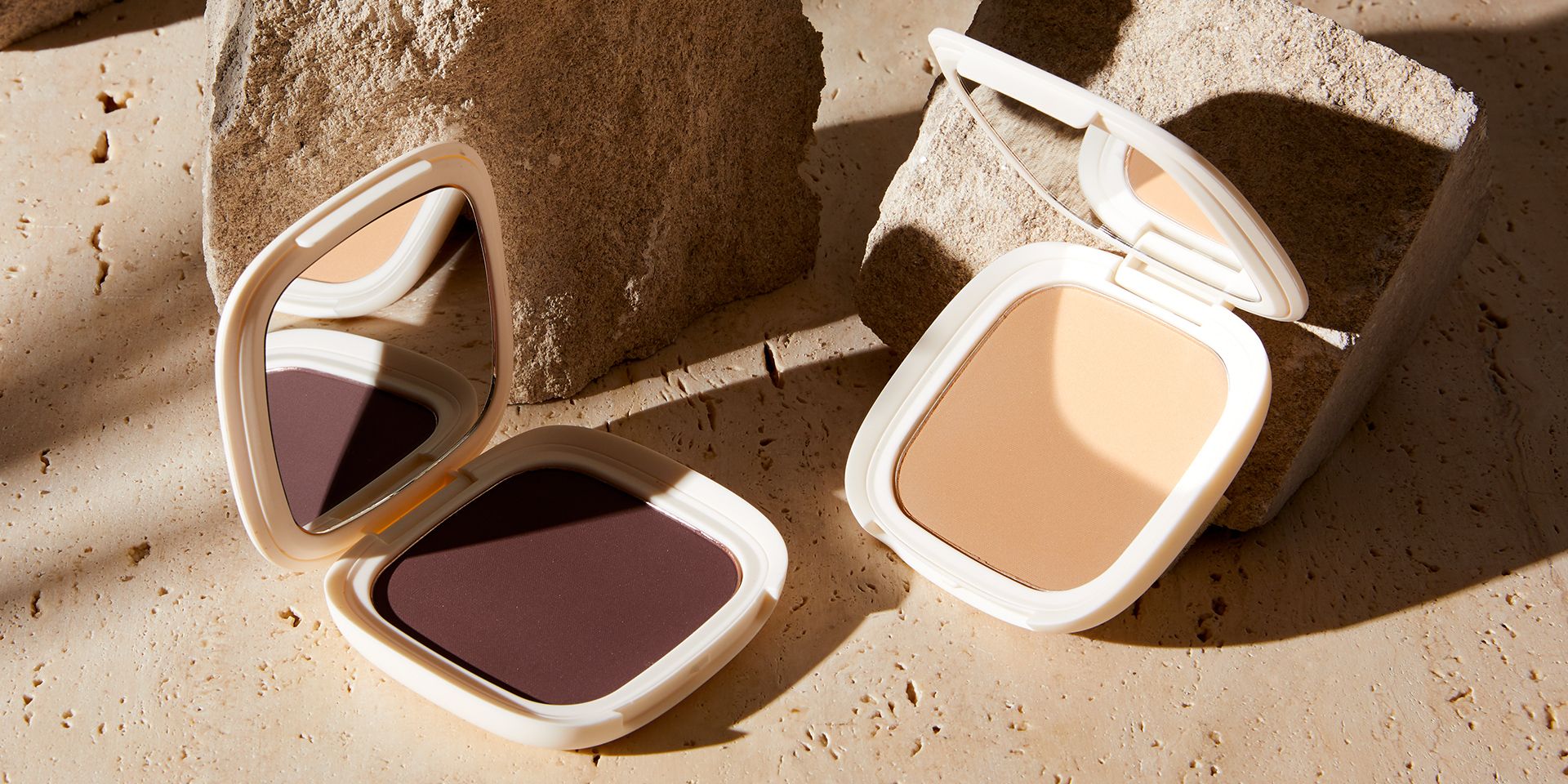 Vesca Beauty bronzer product styled with warm lighting and tropical aesthetic