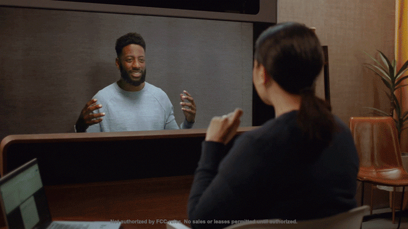 Google Beam demonstration showing natural scale 3D video communication with multiple participants in a realistic meeting environment